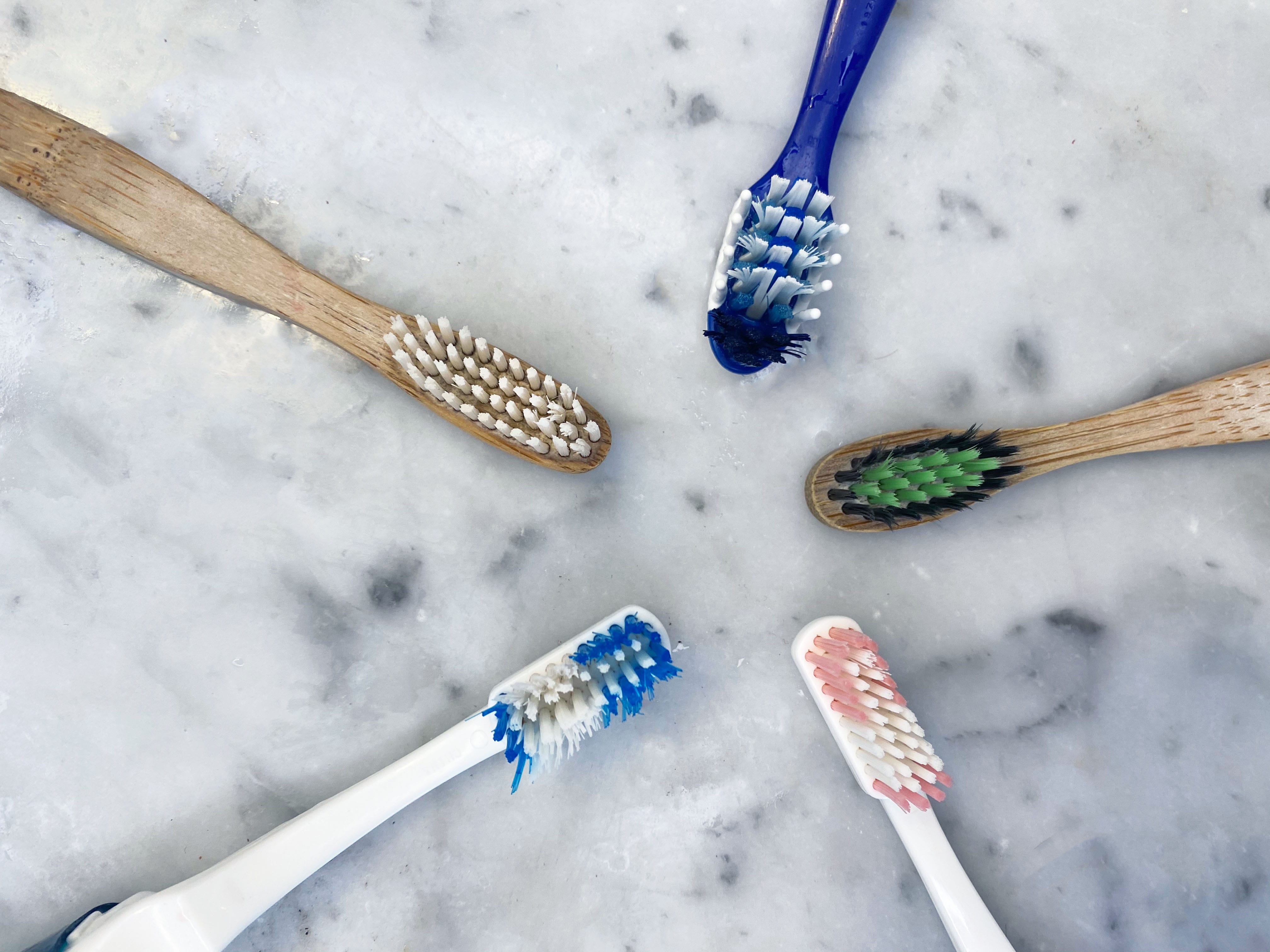 five old toothbrushes