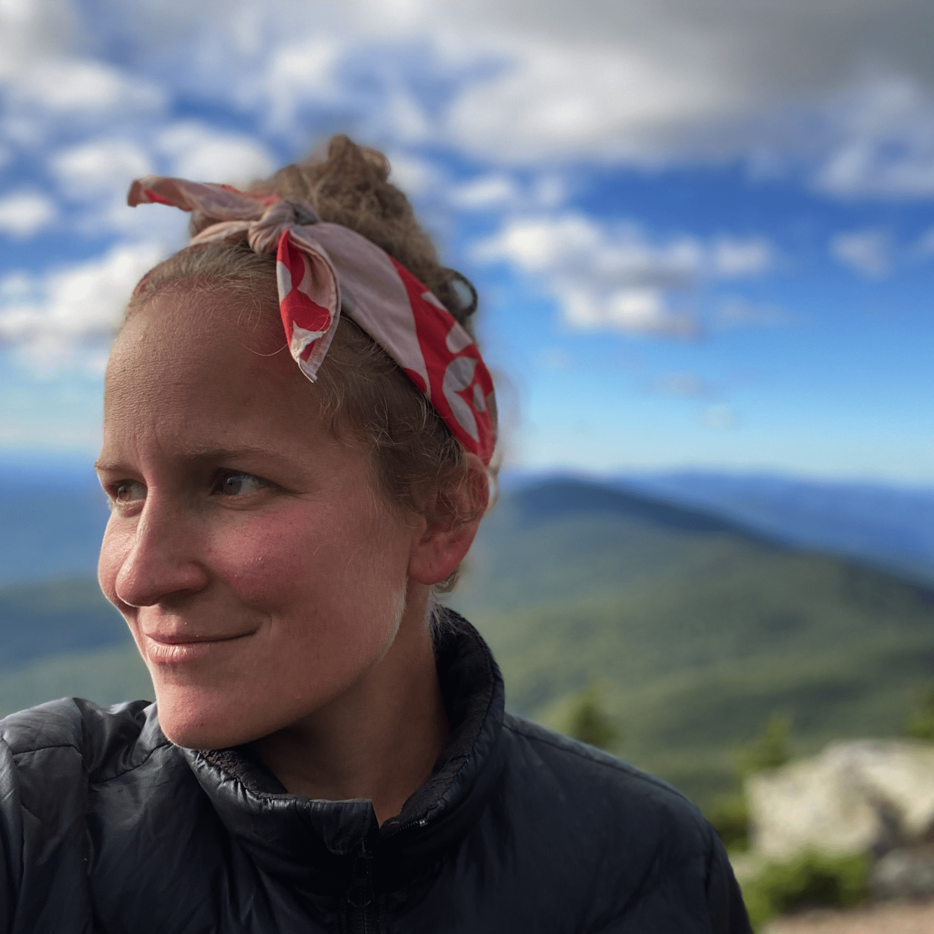 profile of woman with mountain backdrop